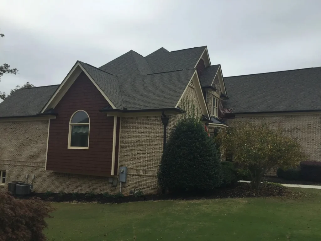 Newly installed residential roof with clean, uniform shingles