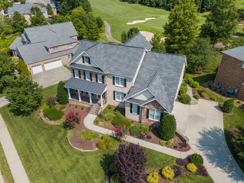 Luxury residential home exterior representing higher-end roofing projects