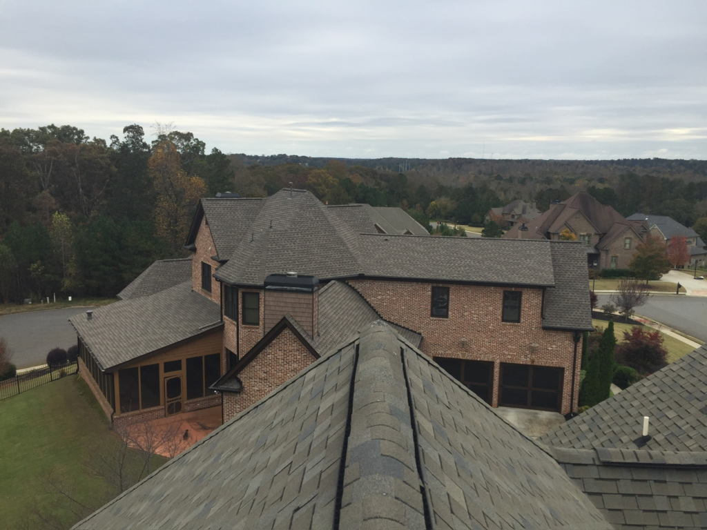 Upscale residential home exterior in Rivermont neighborhood with mature tree coverage