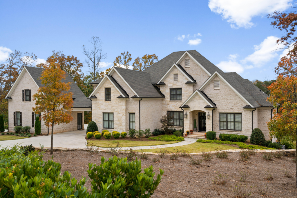 Upscale residential home exterior representing a homeowner ready to schedule a roof inspection